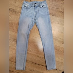 Women's "Wax Jeans". Light blue wash. Size 7.